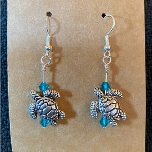 Sea turtles with Swarovski crystals.  Sterling silver ear wires.